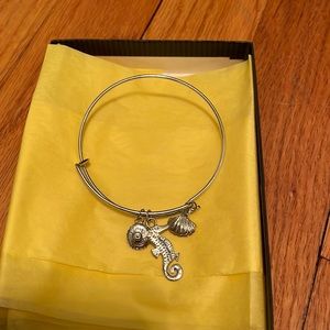 Silver tone sea horse bracelet